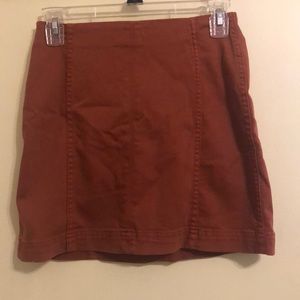 Burnt orange mini denim skirt